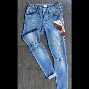 Girls embroidered, distressed jeans.